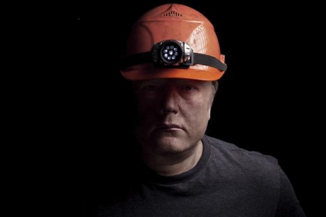 A miner with head torch