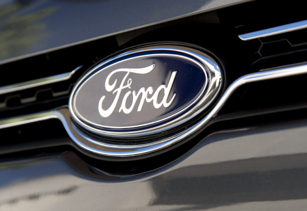 Tight image of Ford logo on front of a vehicle