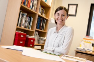 Griffith academic Sharyn Rundle-Thiele sits behind her office desk.
