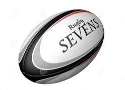 White, blacka and grey rugby ball with rugby sevens written on it