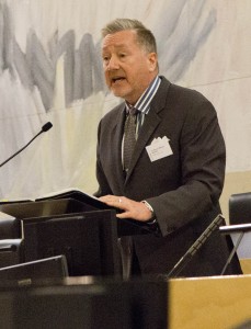 Professor William MacNeil at the microphone