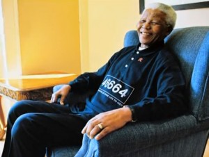 Nelson Mandela sitting in chair