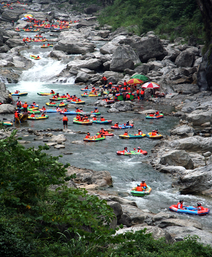 People in small boats rafting in China