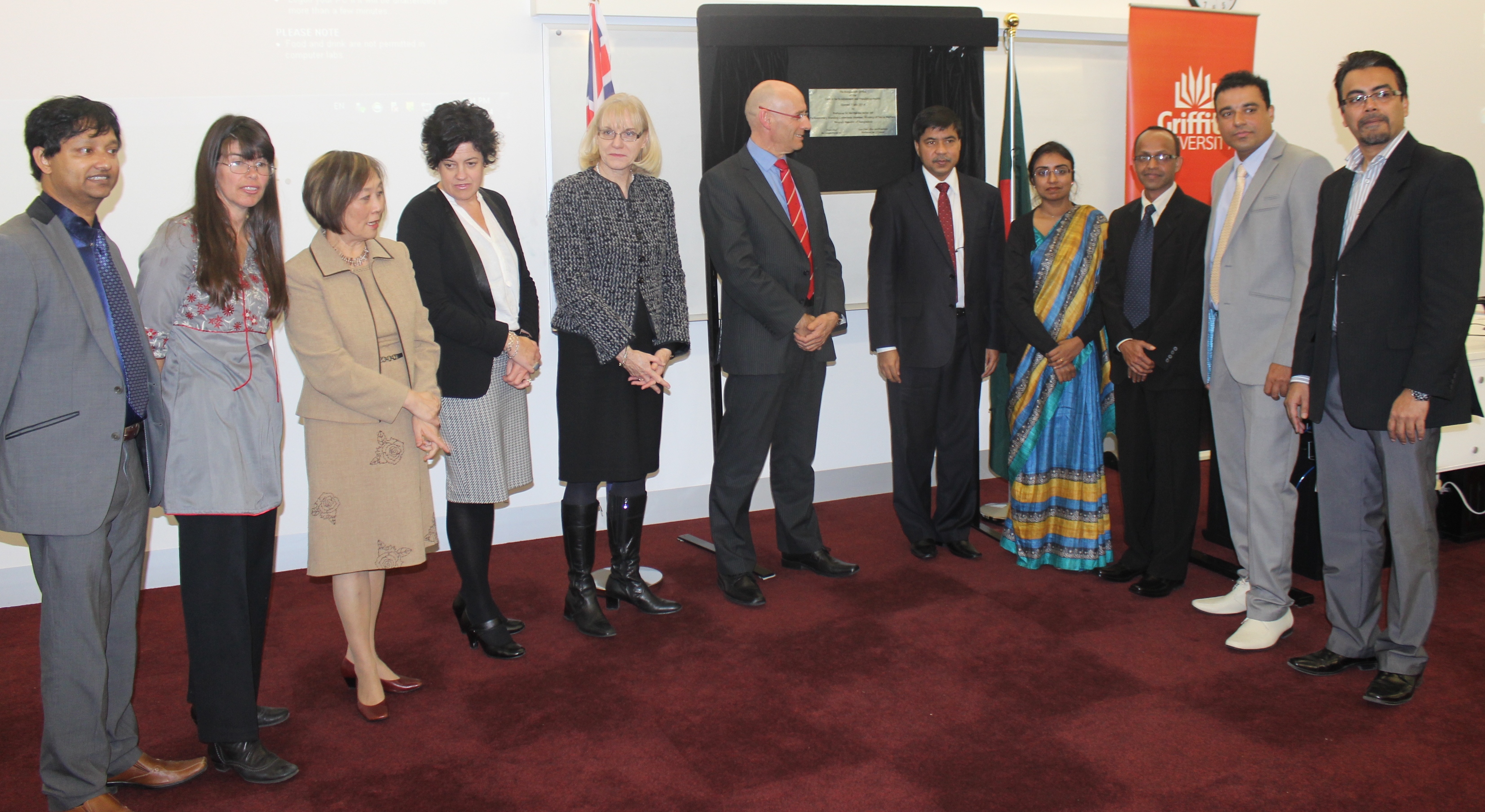 Dignitaries at the unveiling of a plaque to mark the opening of the Bangladesh Program within the Centre for Environment and Population Health