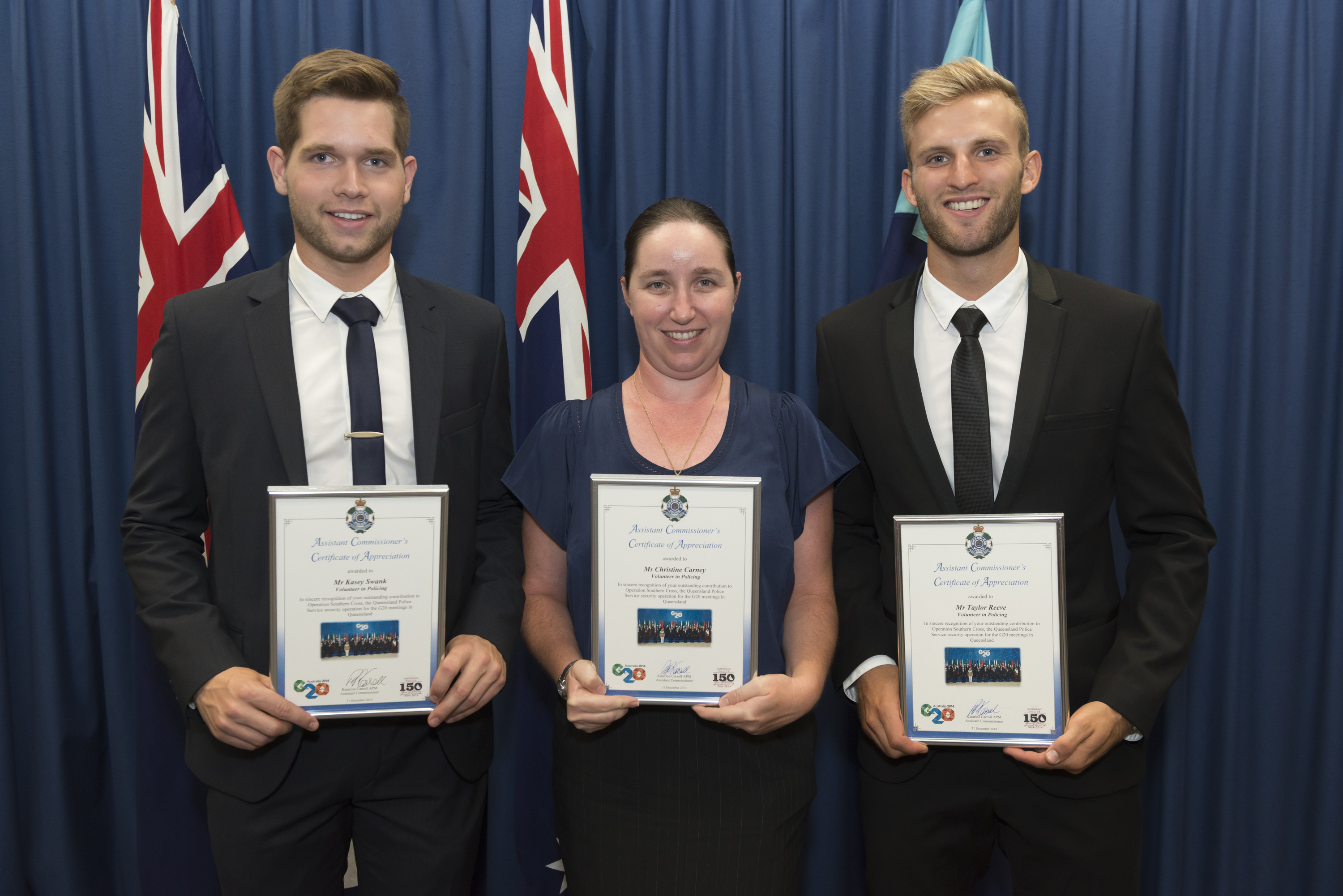 Griffith criminology students Christine Carney, Kasey Swank and Taylor Reeve receive their police awards following their work in the lead up to the G20