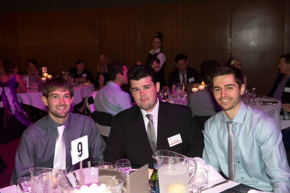 Ventoura co-founders Jamin Wood (left) and Raymond Siems (right) with Callum Macbeth (centre), who is now part of the Ventoura team, at their graduation dinner from Griffith.