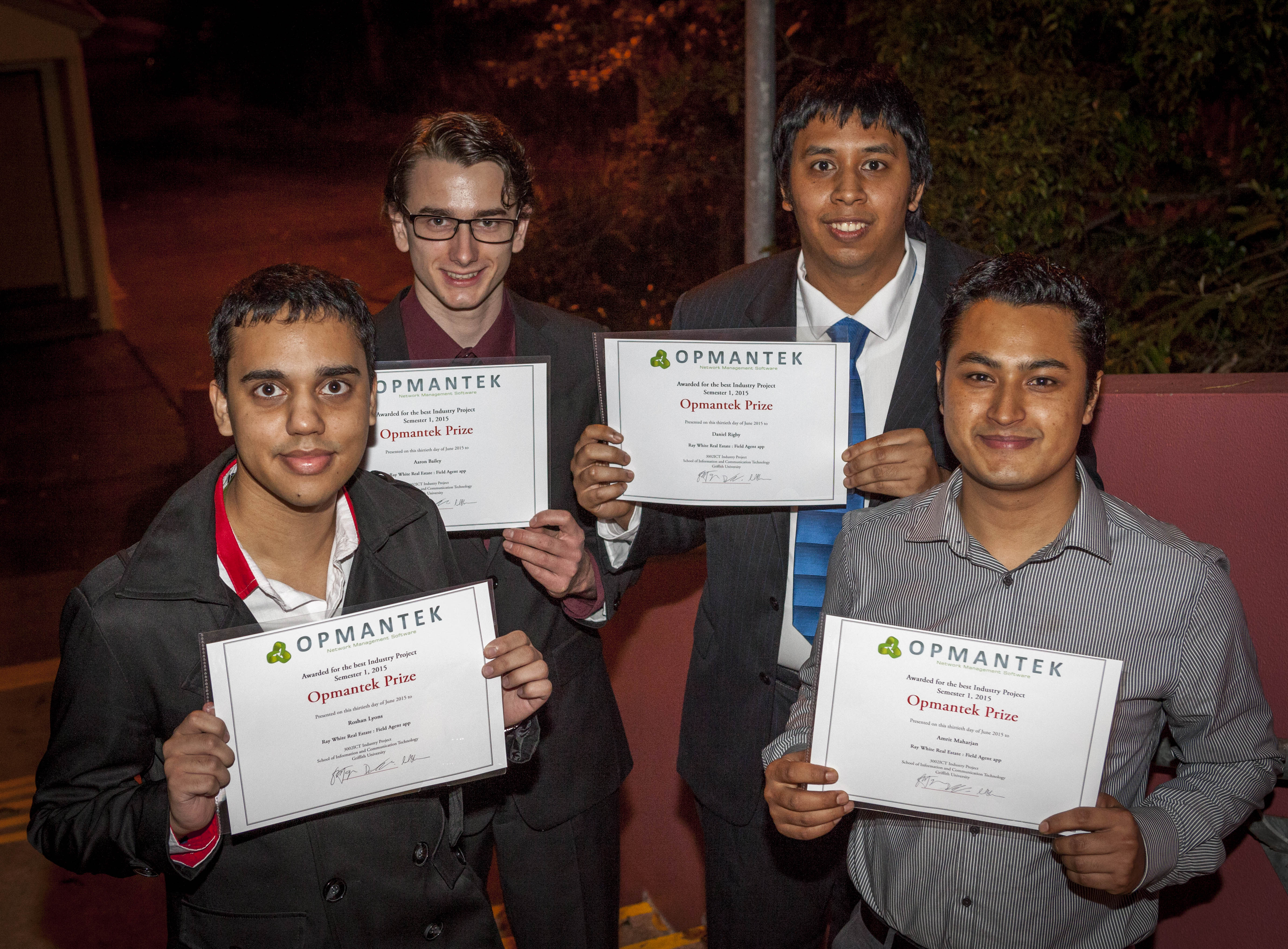 Winners of the 2015 Opmantek Prize, from left, ICT students Roshan Lyons, Aaron Bailey, Daniel Rigby and Amrit Maharjan, holding their certificates
