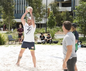Canberra Raiders Player Cleveland McGhie plays volleyball with Indigenous students. 