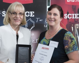 Ms Sarah-Jane Gregory accepts her Excellence in Teaching award from Professor Henly
