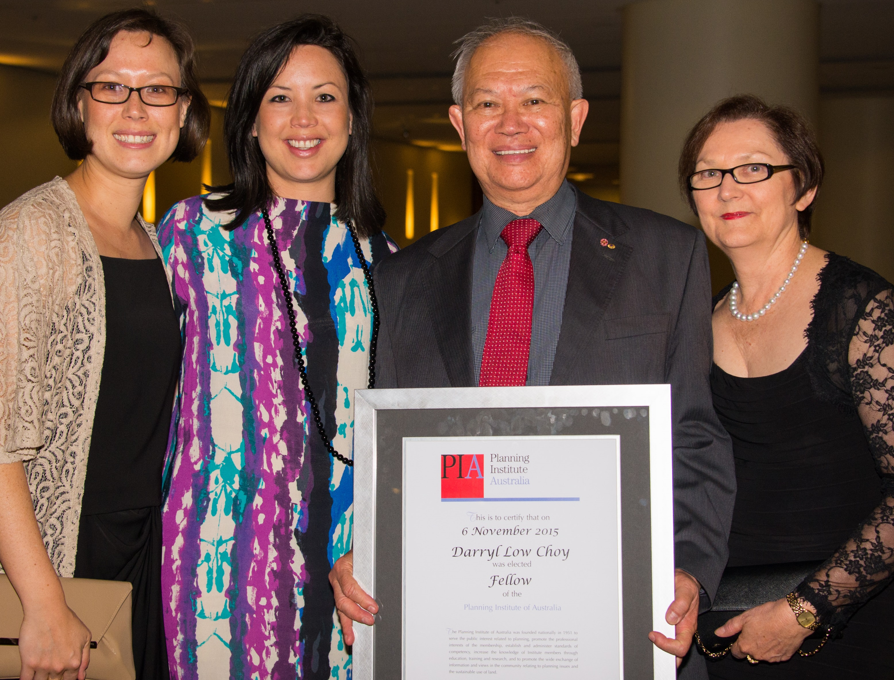 Professor Darryl Low Choy, new Fellow of the Planning Institute of Australia, with wife Nancy and daughters Jacquie and Amanda