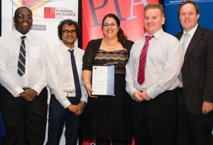 Griffith University's George Kenende, Ahmed Hassaan Zuhair, Pilar Munoz-Najar and Bryan Hortin, with Darren Crombie, Queensland Director of the PIA