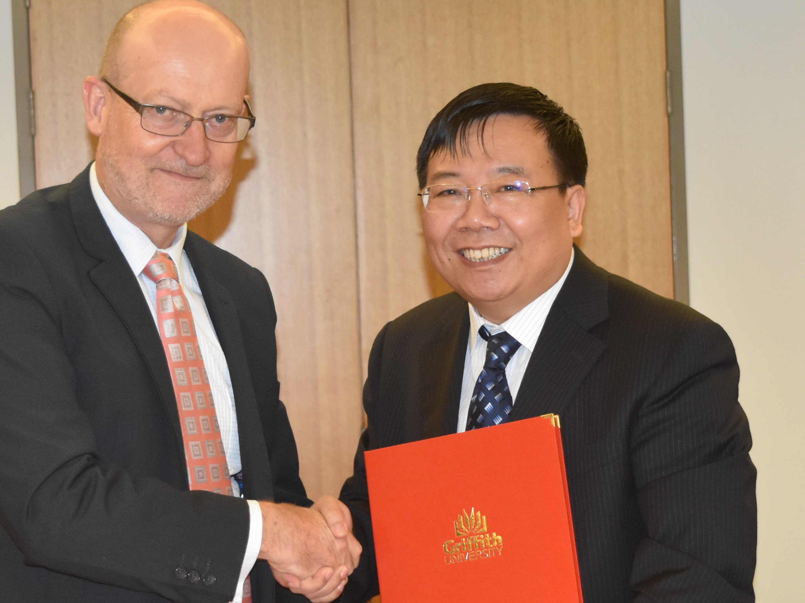 Griffith Senior Deputy Vice Chancellor, Professor Ned Pankhurst, and Professor Minghua Liu, Director of the National Center for Nanoscience and Technology (Chinese Academy of Sciences) at today's signing