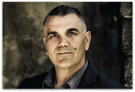 Headshot of Griffith University alumnus Professor Chris Sarra, who has been named NAIDOC Person of the Year