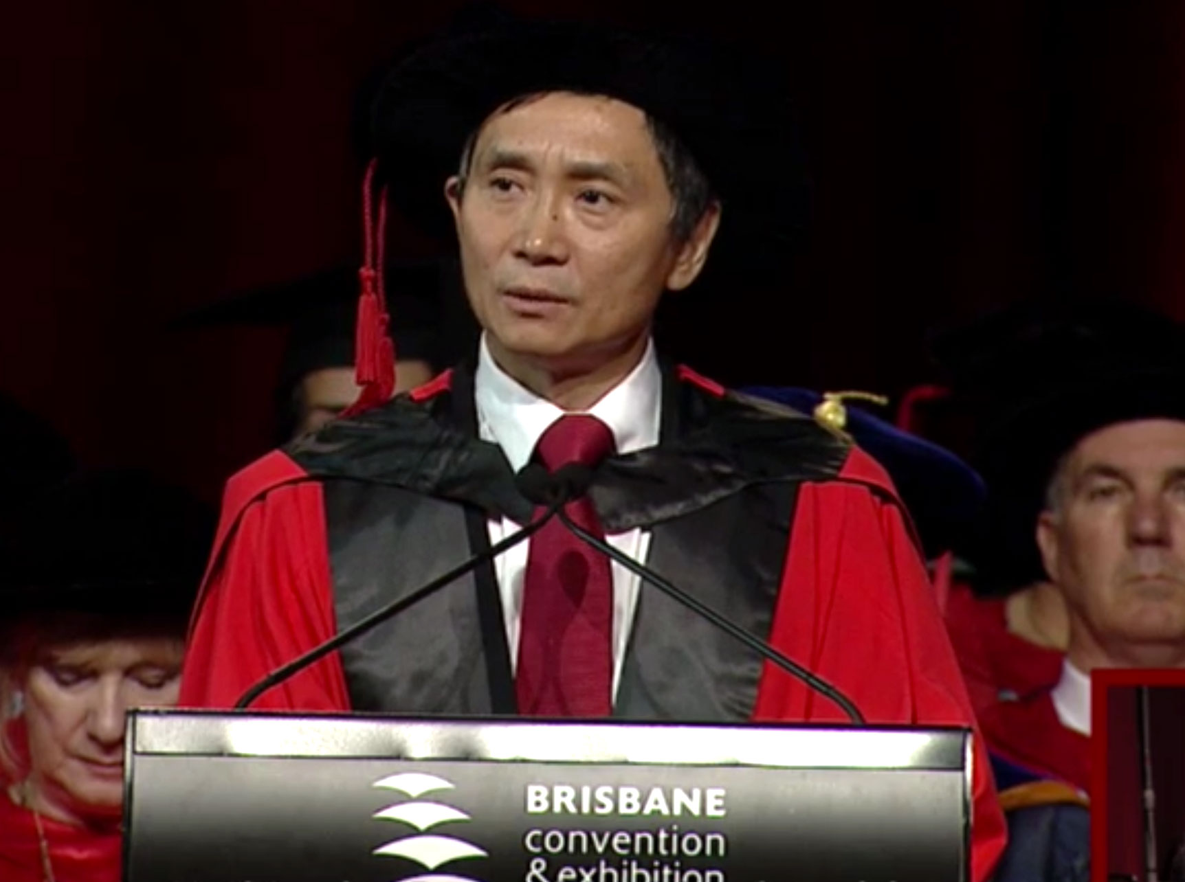 Li Cunxin presenting the Occasional Address at a Griffith University graduation ceremony.