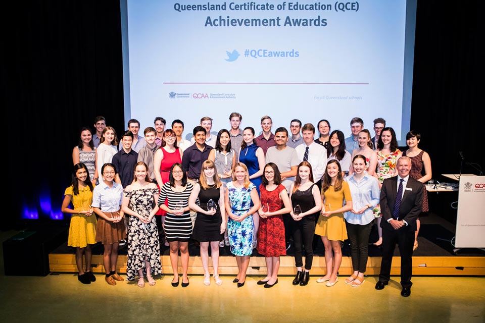 The 34 students who were recognised for the exceptional academic results with Education Minister Kate Jones (front, centre).