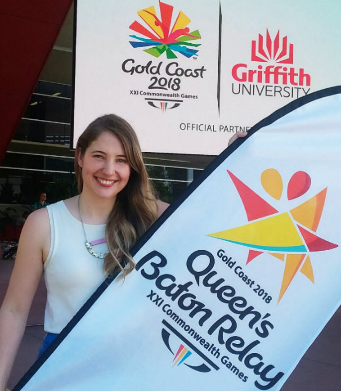 Grffith Art graduate Elise Appleton shows off her Commonwealth Games 2018 design