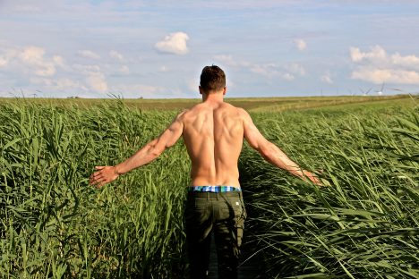 Strong man in field