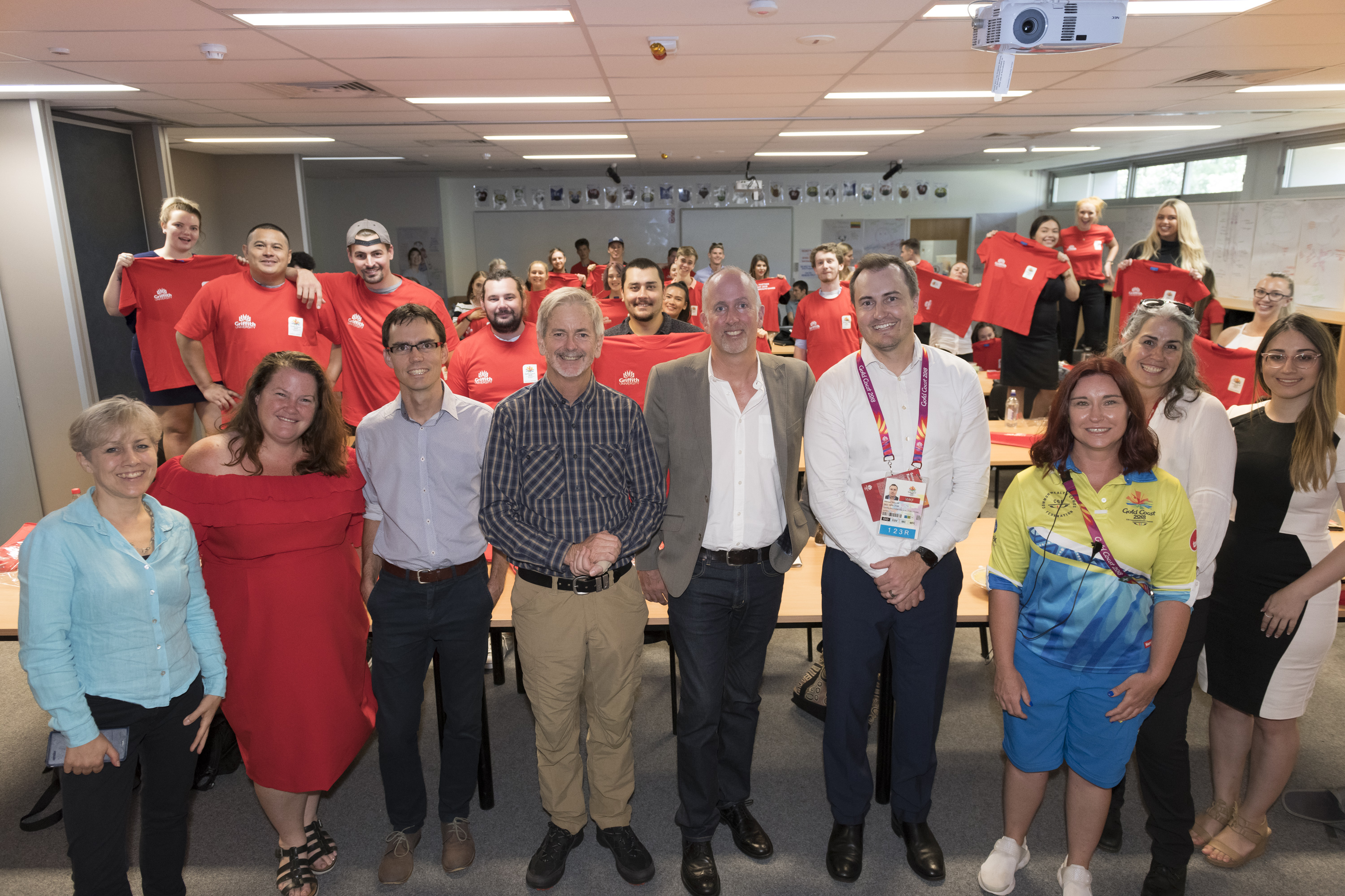 Back row: Griffith journalism students prepare for their GC2018 journalism experience. Front row from left; Virginia Balfour and Nance Haxton (Griffith), Conal Hanna (Fairfax), Professor Mark Pearson and Professor James Carson(Griffith), Marcus Taylor (GOLDOC), Megan Walker (2018 Commonwealth Games International Zone Manager), Faith Valencia-Forrester and Audrey Courty (Griffith).