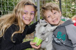 Open Day activities, children with goat