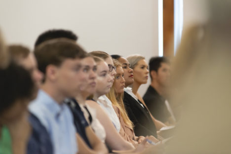 Law students listen intently during a lecture