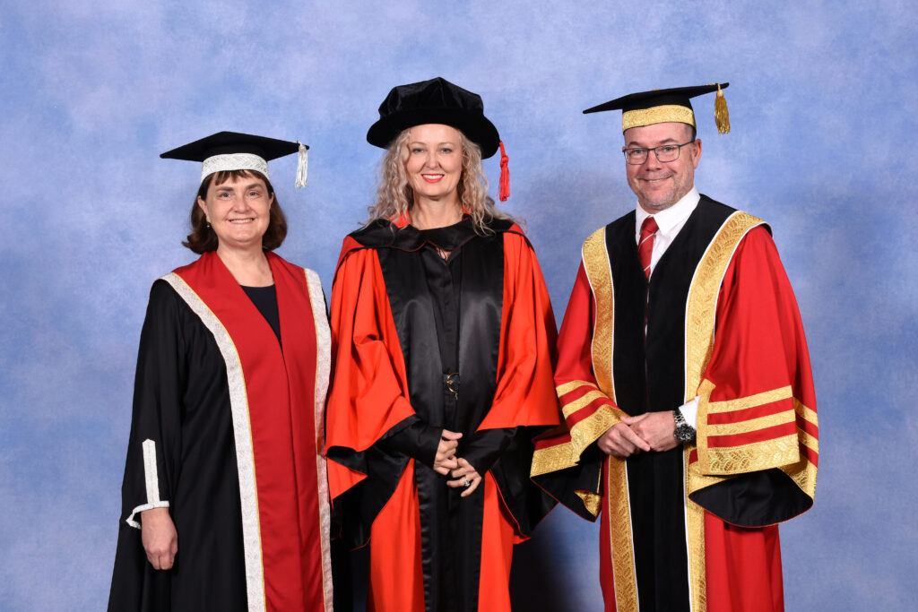 Tracey Vieira with Vice Chancellor Carolyn Evans and Chancellor Andrew Fraser