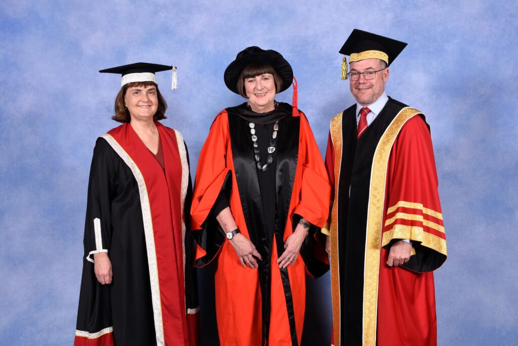 Beth Moyle AM with Vice Chancellor Carolyn Evans and Chancellor Andrew Fraser