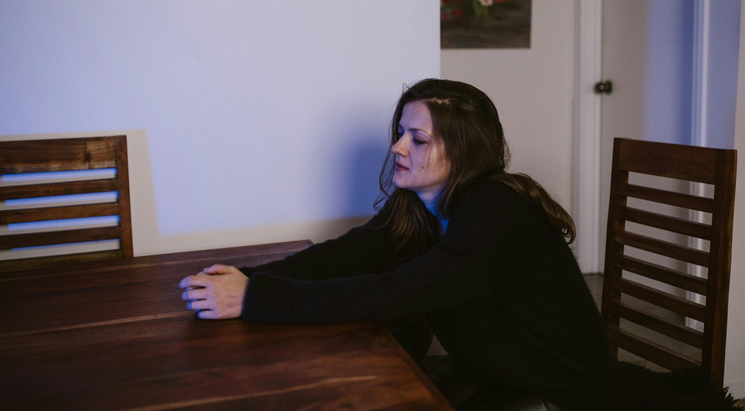 Woman sitting at a table