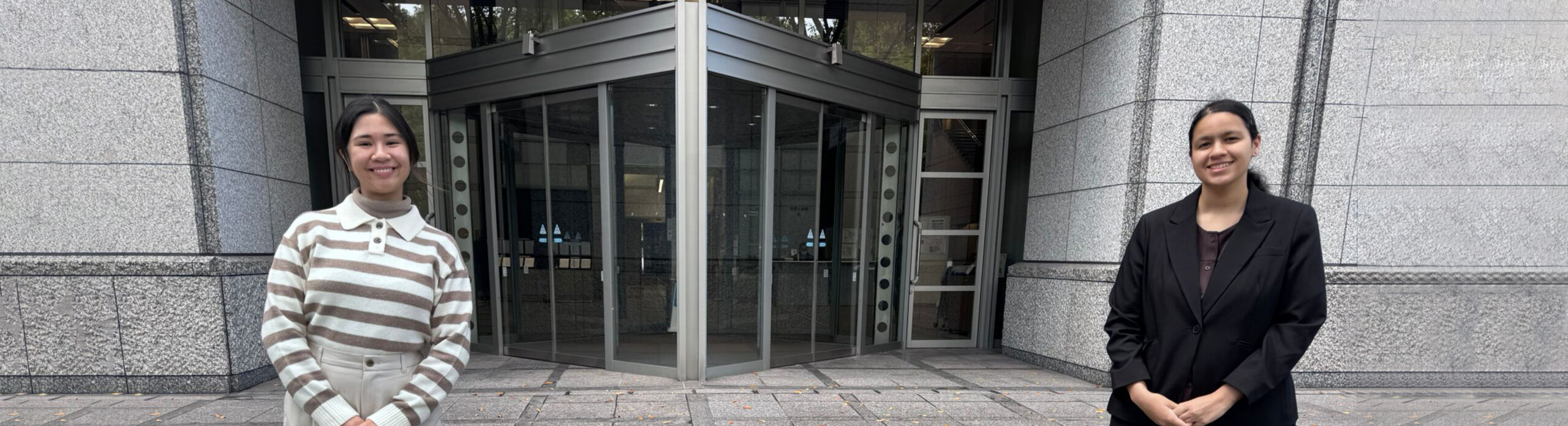 Klyzeah Castanares and Jameelah Noor at the Ugajinlaw building in Tokyo.