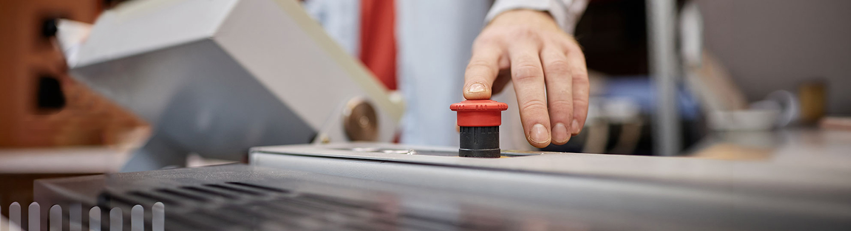 psychosocial safety banner showing finger pressing red button